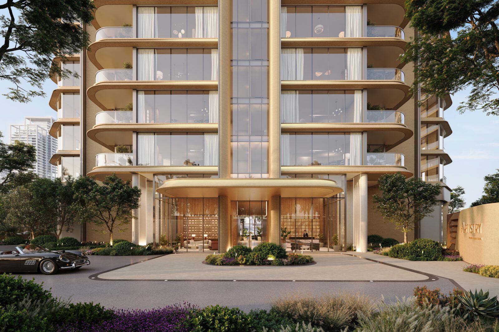 Sculptural tower base with a landscaped porte-cochère arrival and classic car at the door